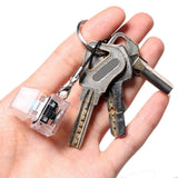 Porte-clés anti-stress à clavier mécanique avec lumière LED